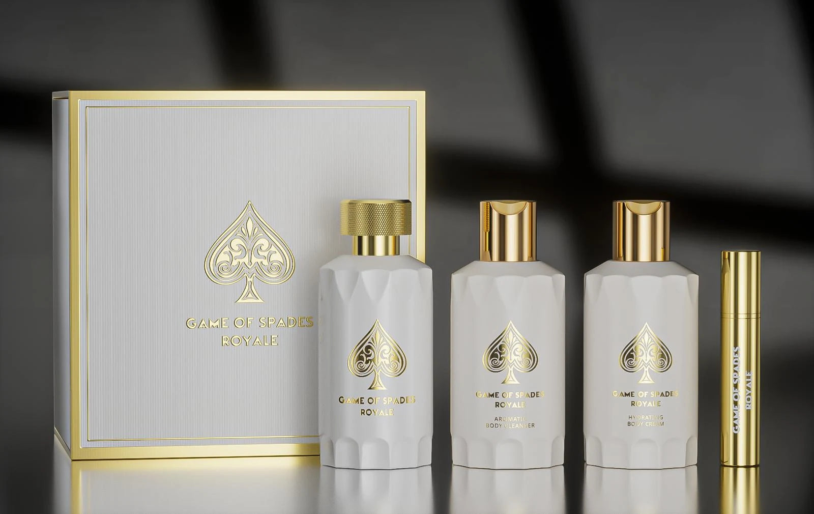 Game of Spades Royale gift set: the box, three white bottles and a gold travel spray